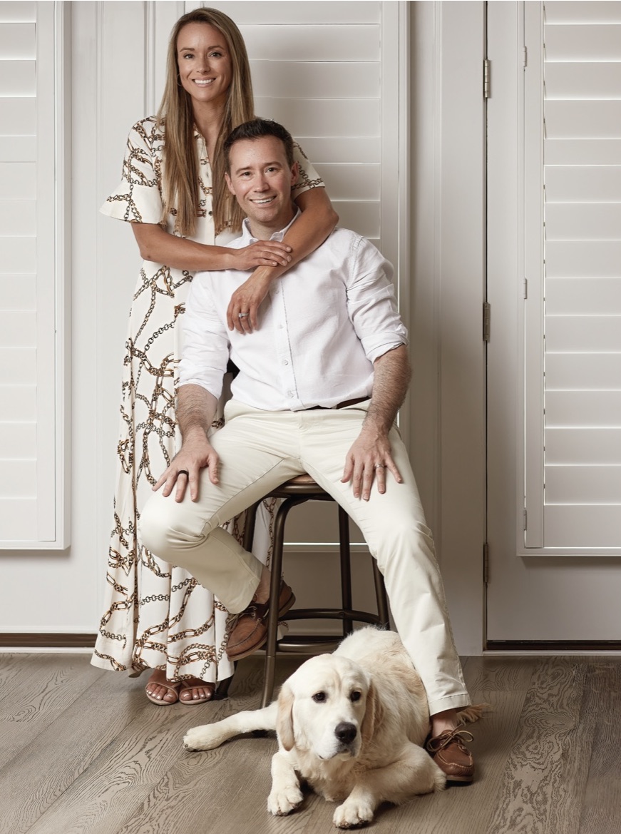 Matt and Elizabeth with their golden retriever named Archie